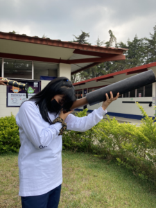 A girl and her telescope 
